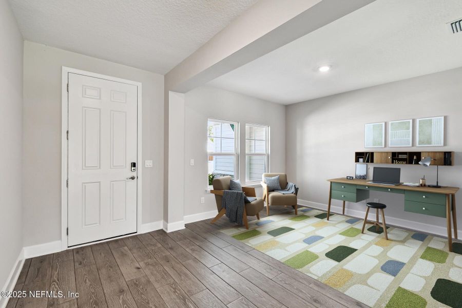 Furnished interior view inside a new home in Tributary 70', Yulee (Image 5).
