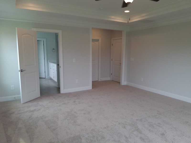 Spacious, unfurnished interior of a new home in Weybridge, Burlington (Image 42).