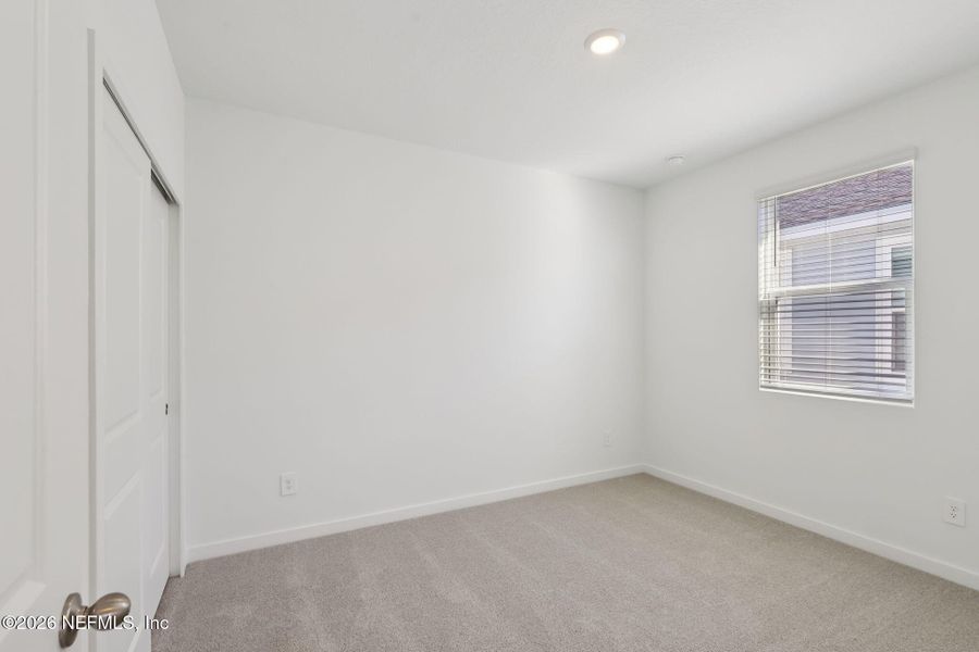 Spacious, unfurnished interior of a new home in Flagler Village - Signature Series, Palm Coast (Image 16).