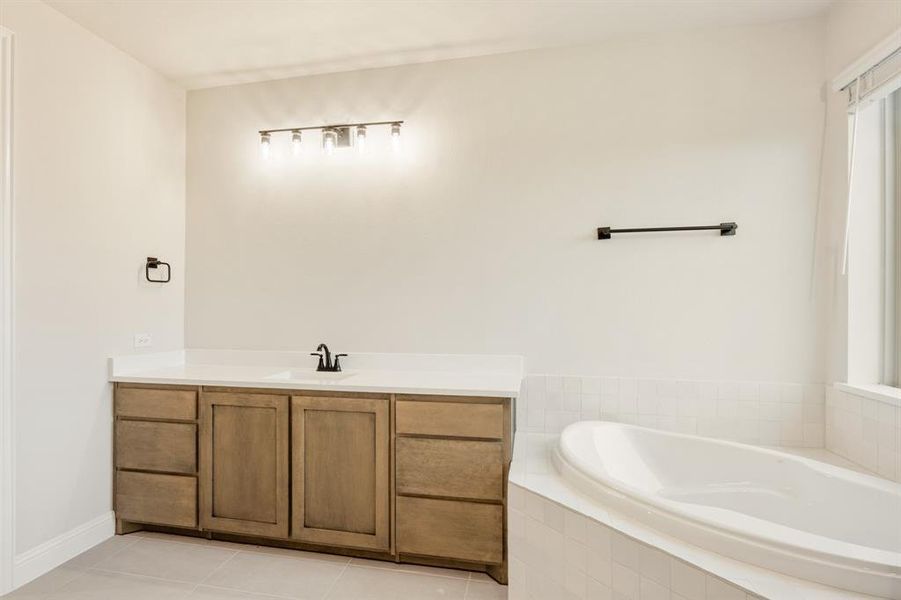 Furnished interior view inside a new home in Sunrise at Garden Valley 60-79, Waxahachie (Image 7).