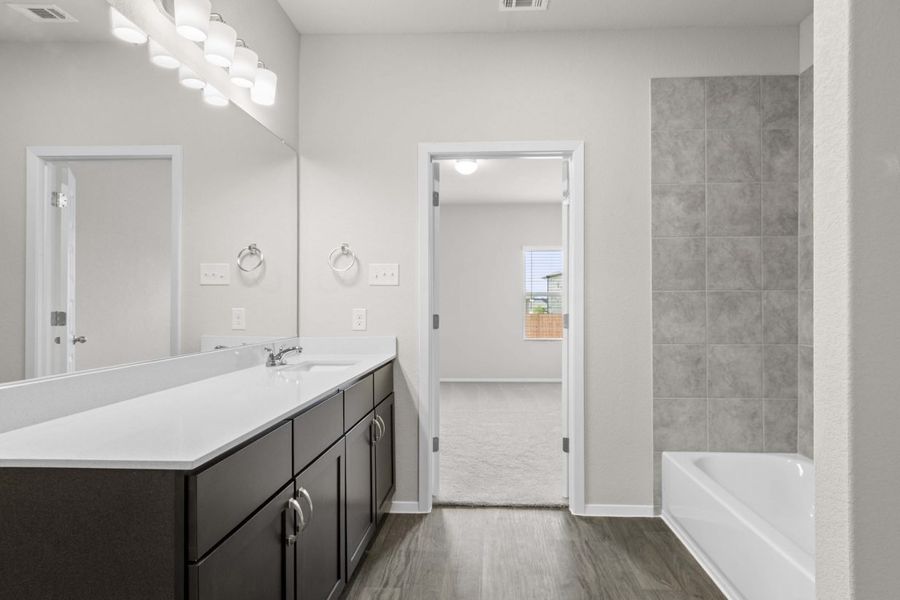 Furnished interior view inside a new home in Oaks at San Gabriel, Georgetown (Image 8).