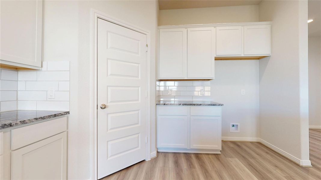 Furnished interior view inside a new home in Lexington Heights 50', Willis (Image 5).