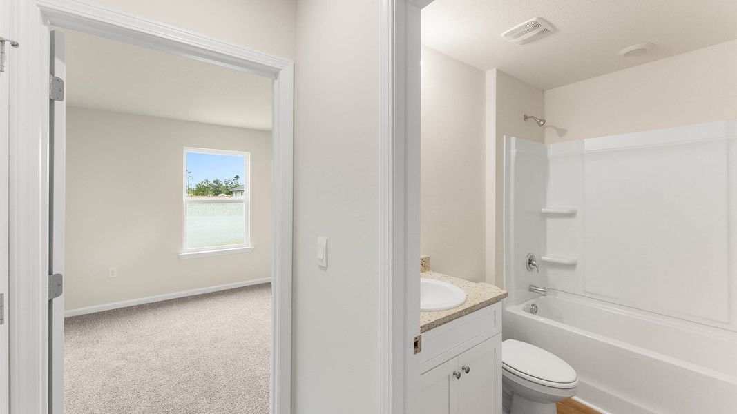 Representative unfurnished interior of a home built from the Allanton by D.R. Horton in Sunny Hills, Chipley (Image 13).