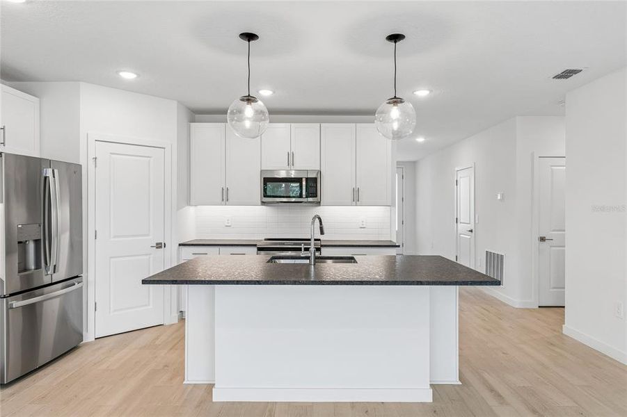 Furnished interior view inside a new home in Aspire at Canter Creek, Davenport (Image 6).