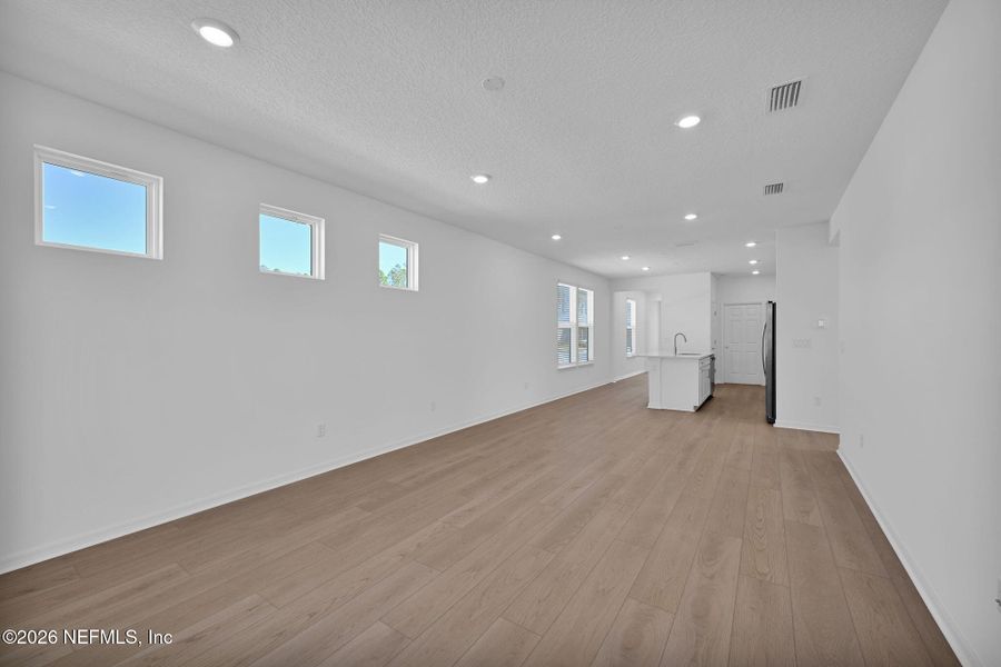 Spacious, unfurnished interior of a new home in Del Webb Wildlight, Yulee (Image 17).