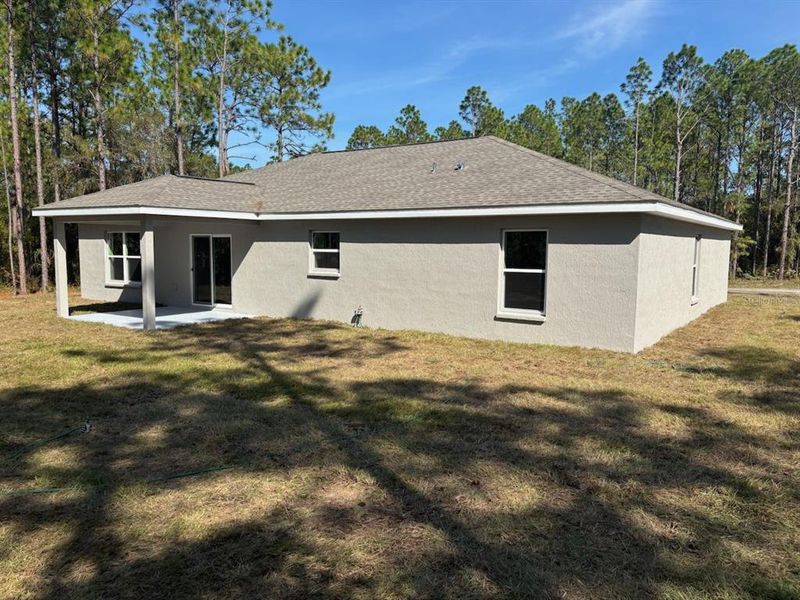 Exterior details and patio area of a home in , Citrus Springs (Image 3).