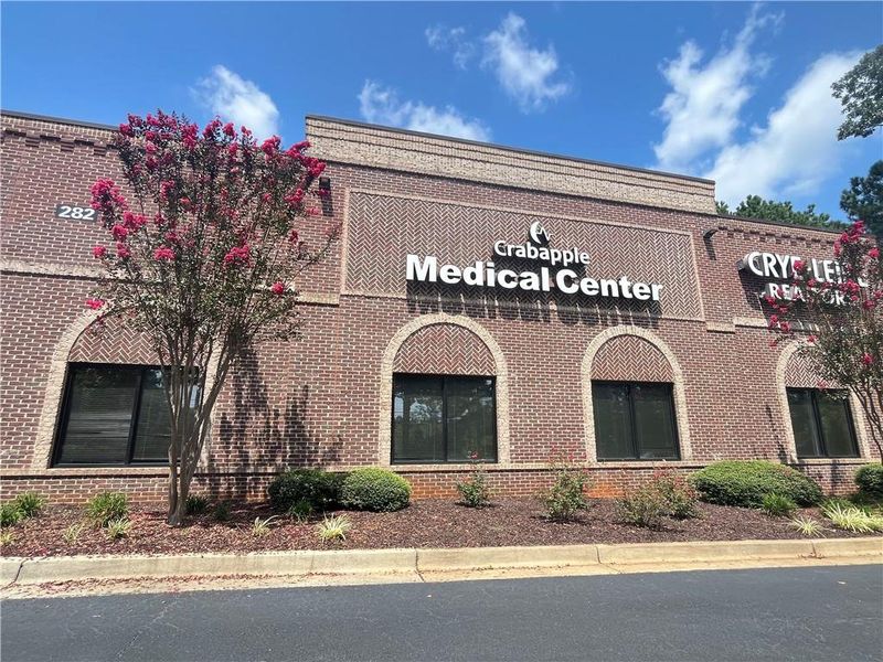 Front exterior of a new home in Liberty Springs, Woodstock, GA, highlighting curb appeal (Image 1). Front exterior of a new home in Liberty Springs, Woodstock, GA, highlighting curb appeal (Image 1).