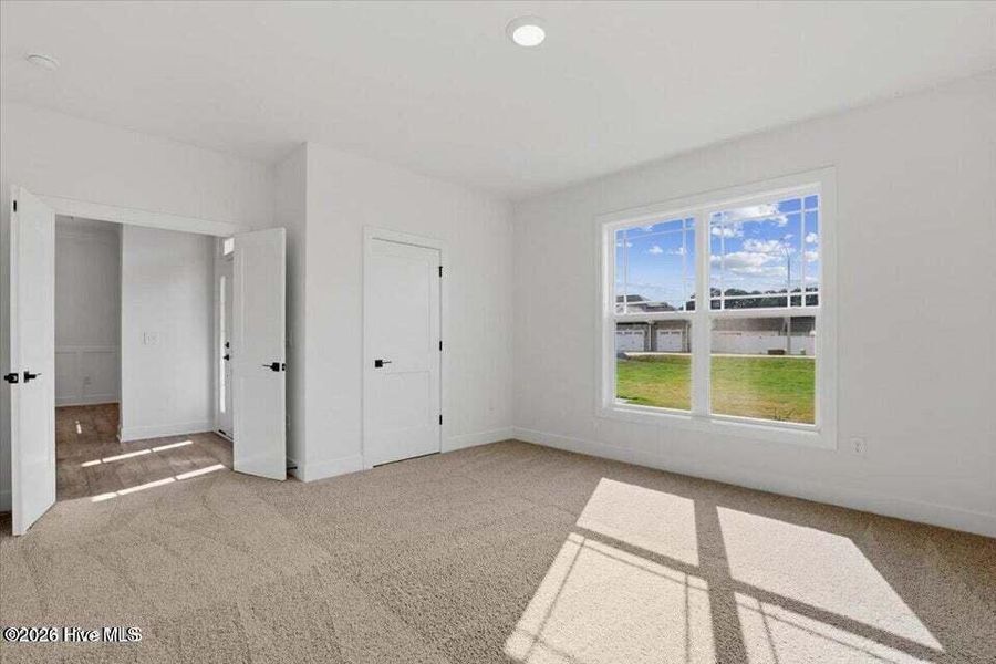 Spacious, unfurnished interior of a new home in Wood Creek Landing, Leland (Image 24). Spacious, unfurnished interior of a new home in Wood Creek Landing, Leland (Image 24).