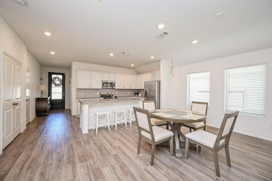 The floors are beautiful luxury vinyl. Runs throughout the space, unifying the design with warmth and durability. The floors are beautiful luxury vinyl. Runs throughout the space, unifying the design with warmth and durability.