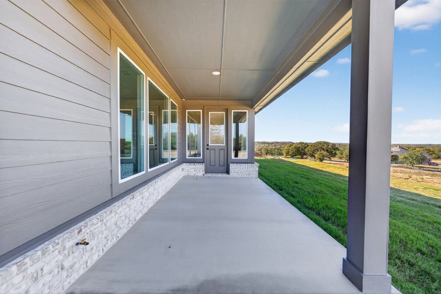Exterior details and patio area of a home in Oak Grove Addition, Springtown (Image 29).