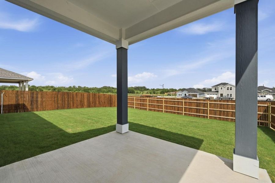 Exterior details and patio area of a home in Watermill-Classic Collection, Uhland (Image 16).