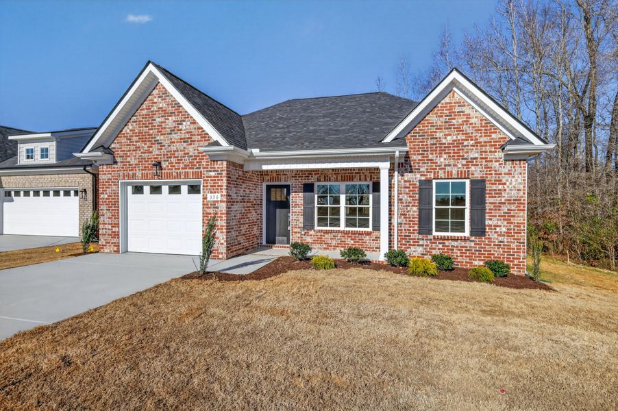 Front exterior of a new home in Legacy Preserve, Tullahoma, TN, highlighting curb appeal (Image 20).