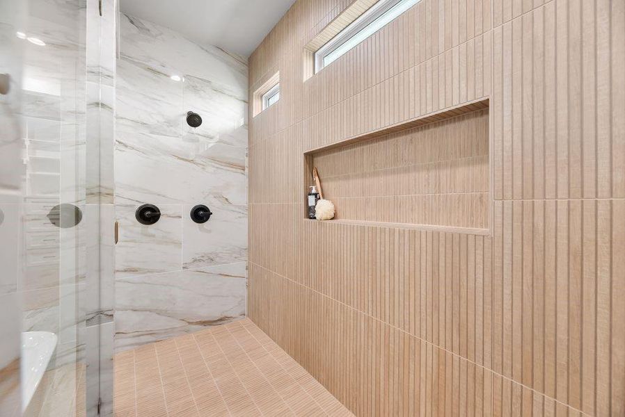 Bathroom with a marble finish shower Bathroom with a marble finish shower