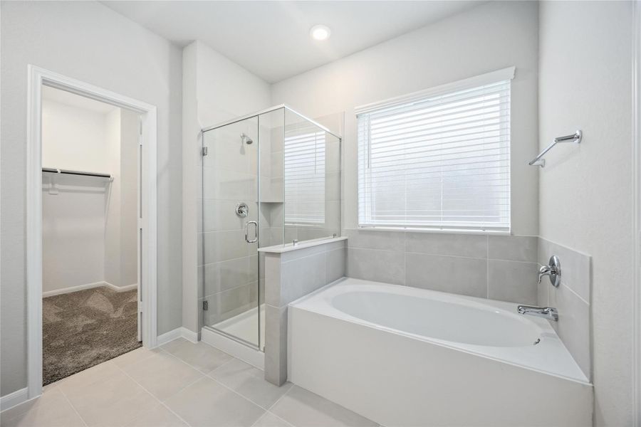 Furnished interior view inside a new home in Sunterra, Katy (Image 12).