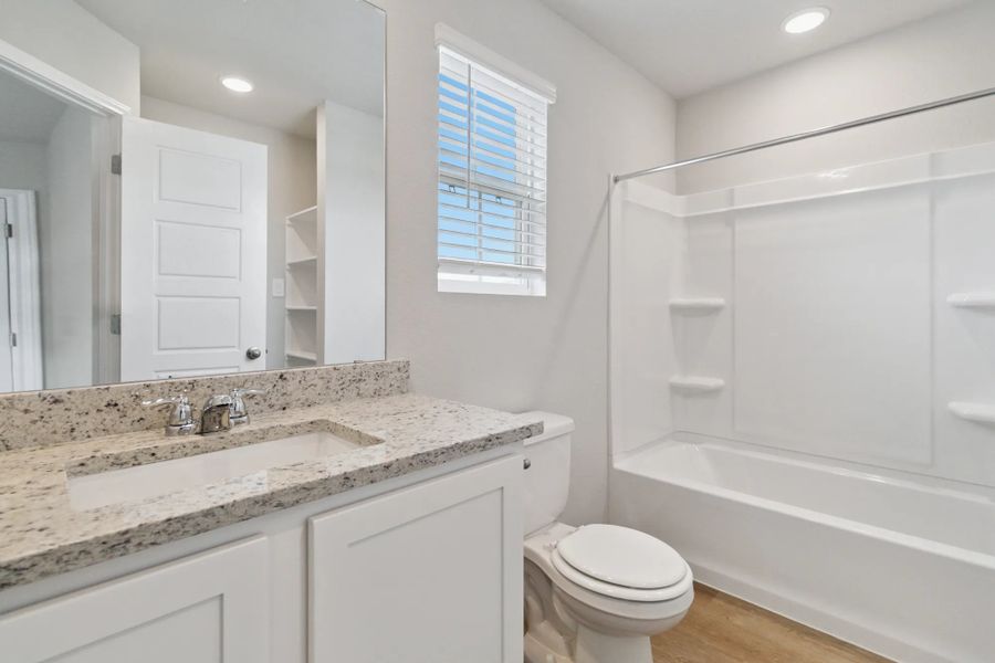 Representative furnished interior of a home built from the Duplex 5736 by TwoTen Communities in Emma Park, Buda (Image 9).