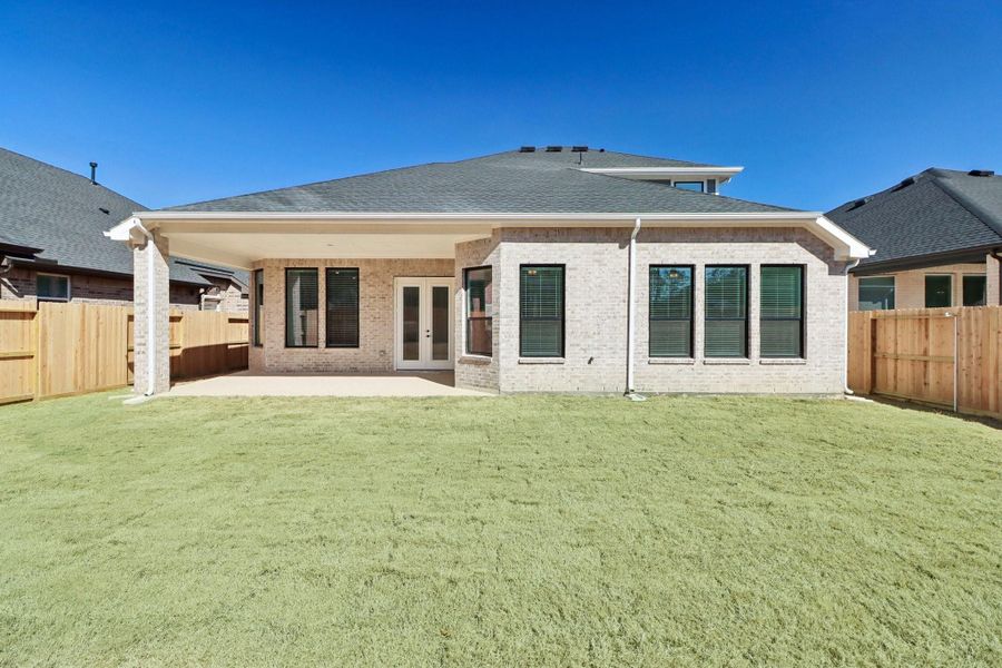 Exterior details and patio area of a home in The Highlands, Porter (Image 18).