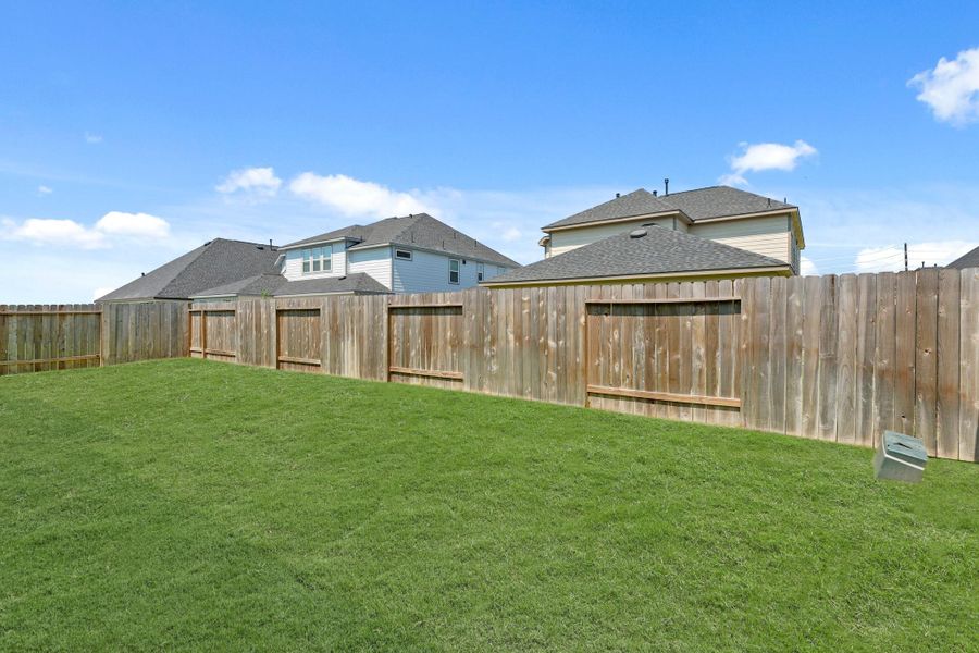 Front exterior of a new home in Briarwood Crossing, Rosenberg, TX, highlighting curb appeal (Image 1).