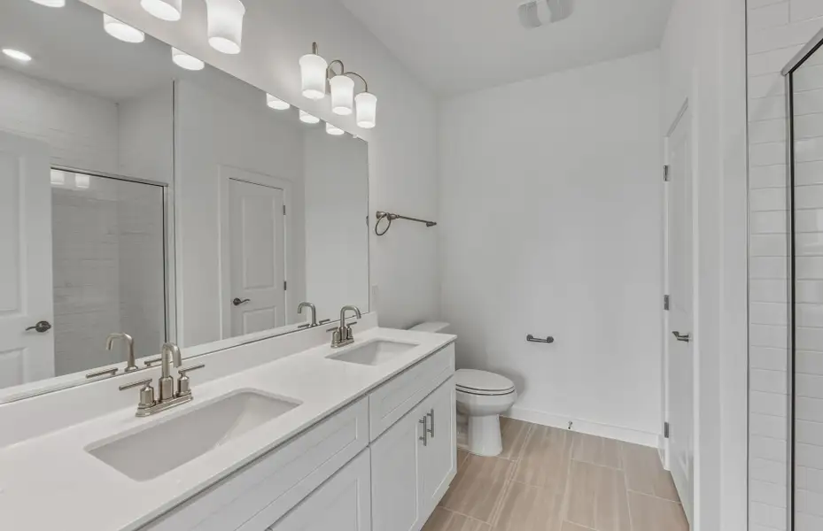 Furnished interior view inside a new home in Crosswinds, Kyle (Image 11).