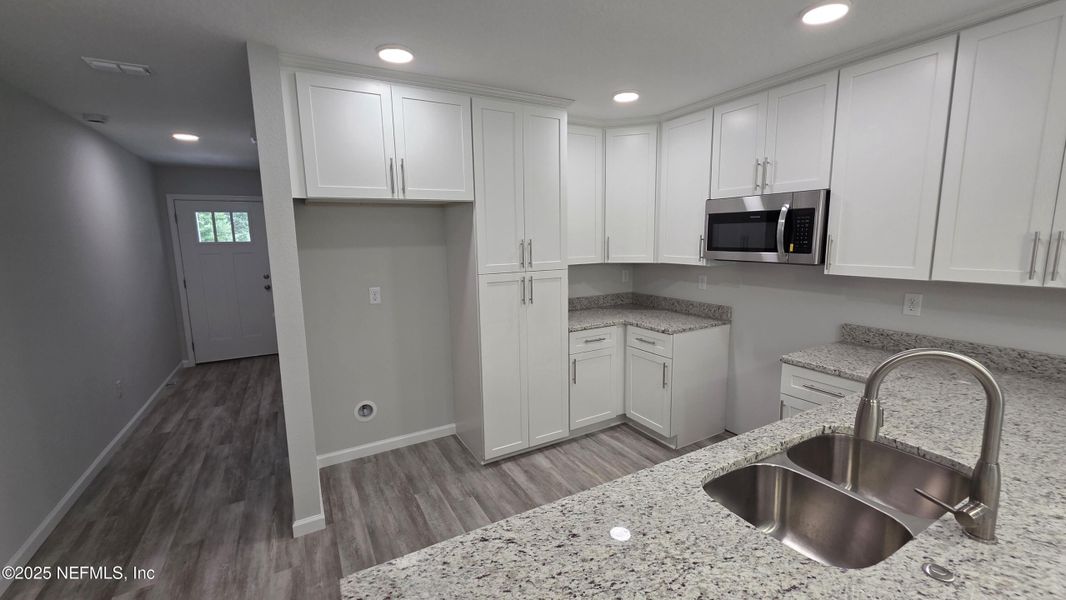 Furnished interior view inside a new home in , Jacksonville (Image 7). Furnished interior view inside a new home in , Jacksonville (Image 7).