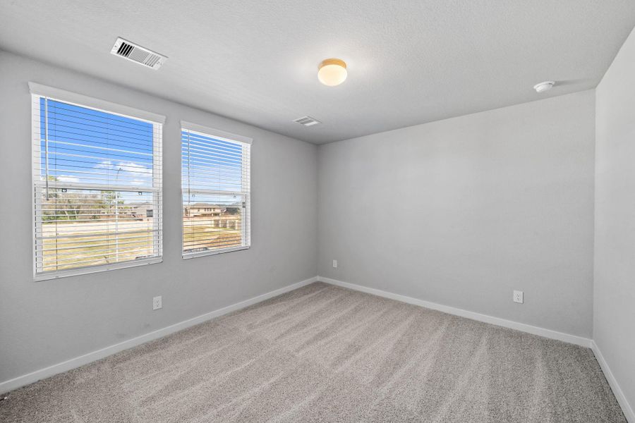 Spacious, unfurnished interior of a new home in Grand Oaks Village, Houston (Image 22).