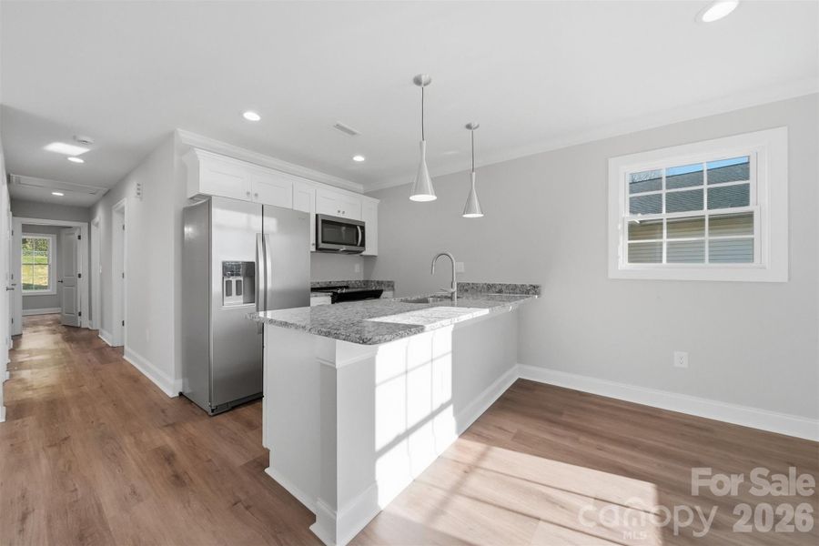 Furnished interior view inside a new home in , Hickory (Image 9).