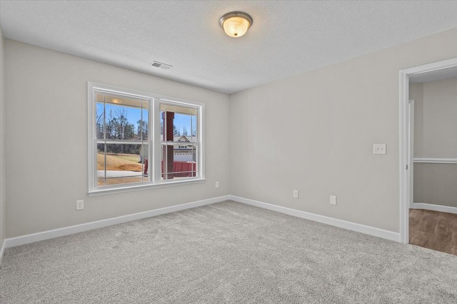 Representative unfurnished interior of a home built from the Brentwood by Enchanted Homes in Lonesome Dove, San Antonio (Image 14).