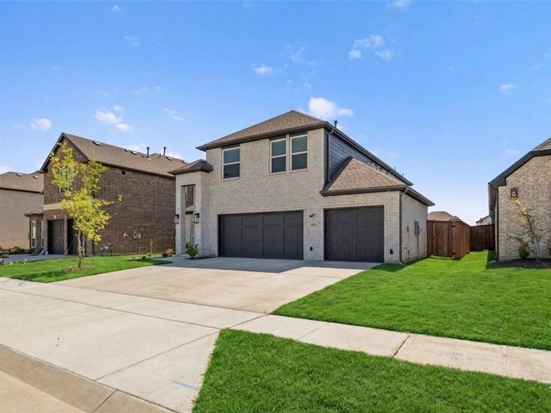 Front exterior of a new home in , Mesquite, TX, highlighting curb appeal (Image 25). Front exterior of a new home in , Mesquite, TX, highlighting curb appeal (Image 25).
