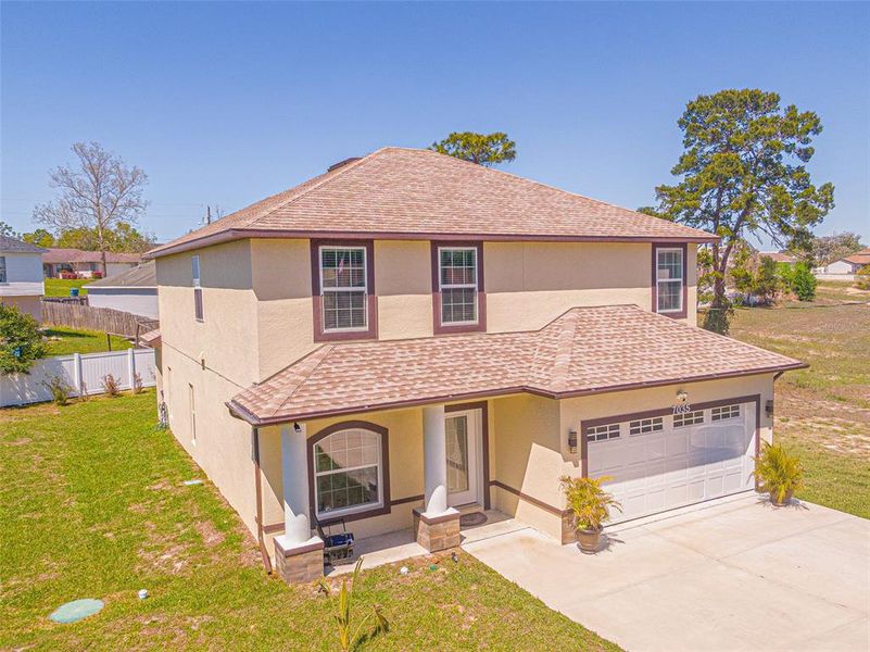 Front exterior of a new home in , Spring Hill, FL, highlighting curb appeal (Image 2). Front exterior of a new home in , Spring Hill, FL, highlighting curb appeal (Image 2).