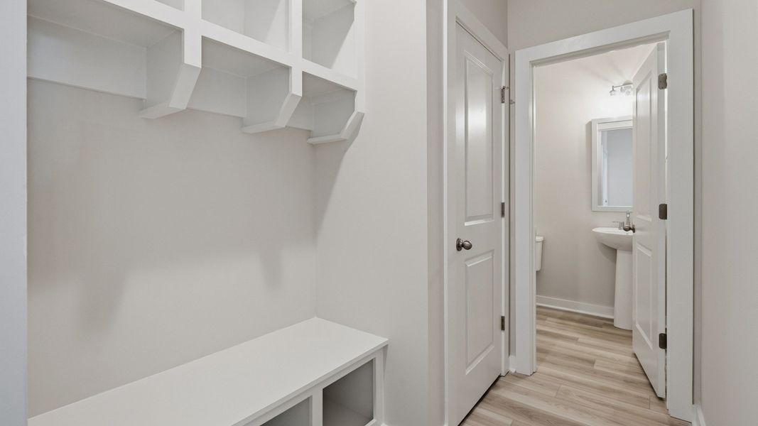 Drop zone right off garage next to bathroom