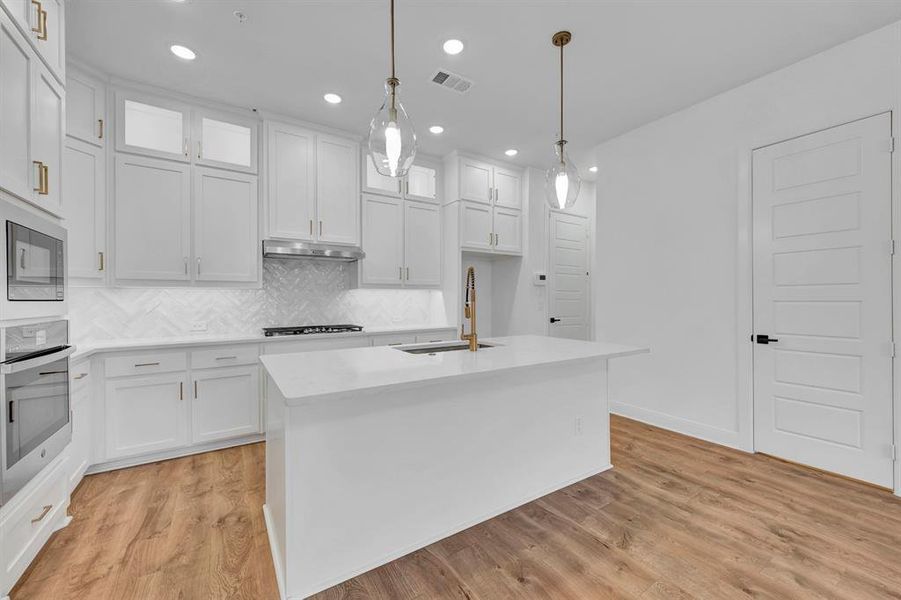 Furnished interior view inside a new home in Hillside at Las Colinas, Irving (Image 15). Furnished interior view inside a new home in Hillside at Las Colinas, Irving (Image 15).