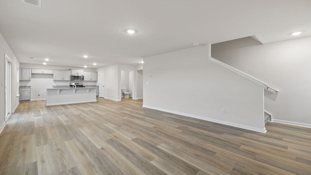 Spacious, unfurnished interior of a new home in Bentley Park, Greenwood (Image 19).