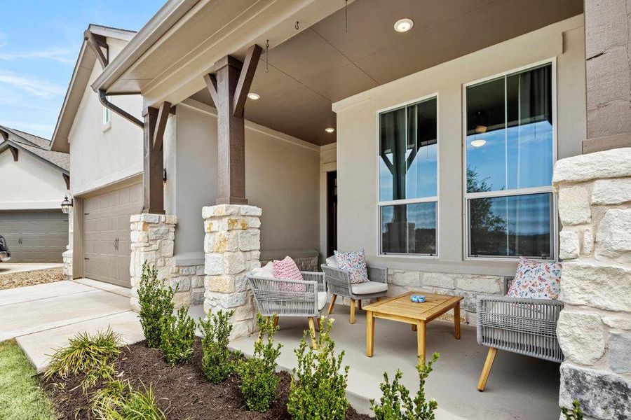 View of patio / terrace with an attached garage