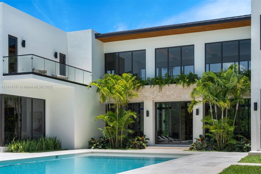Front exterior of a new home in , Pinecrest, FL, highlighting curb appeal (Image 26).