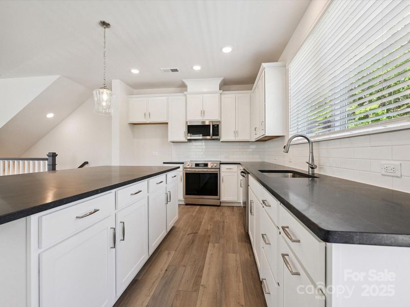 Furnished interior view inside a new home in Central Living at Craig, Charlotte (Image 12).
