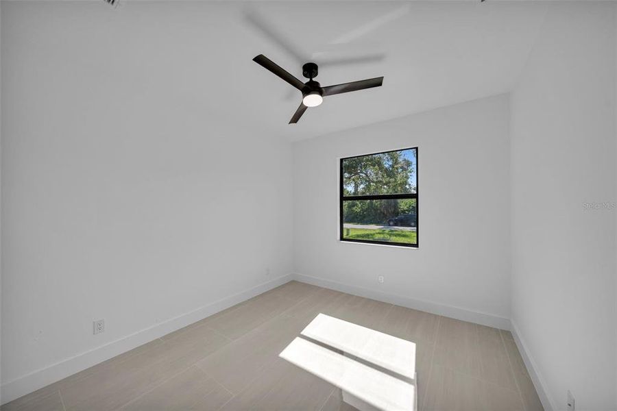 Spacious, unfurnished interior of a new home in , Port Charlotte (Image 11).