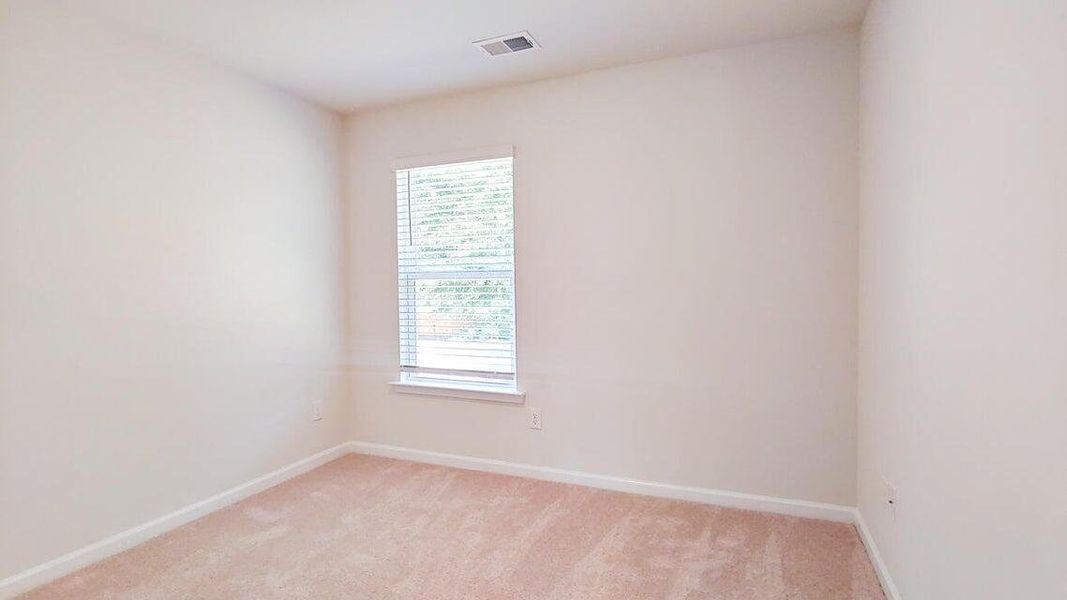 Spacious, unfurnished interior of a new home in Garbon Fields, Summerville (Image 23).