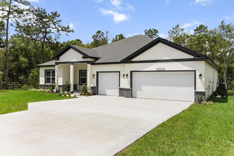 Front exterior of a new home in , Ocala, FL, highlighting curb appeal (Image 23).