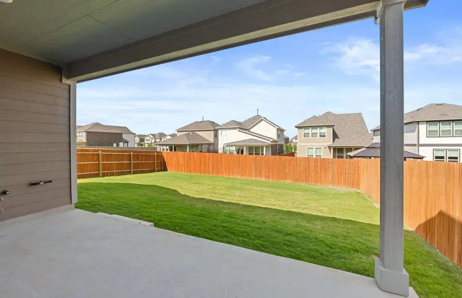 Exterior details and patio area of a home in Saddleback at Santa Rita Ranch, Liberty Hill (Image 6).