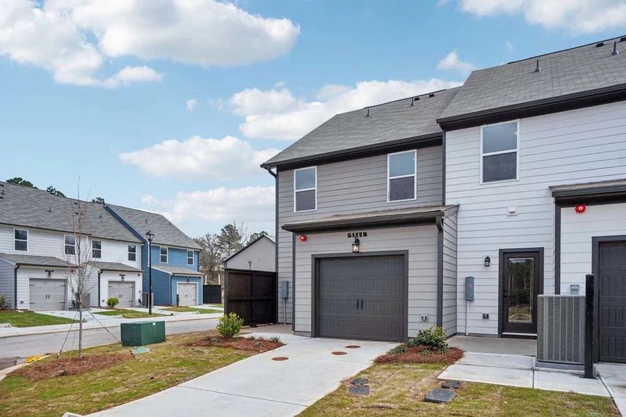 Rear Exterior with One Car Garage