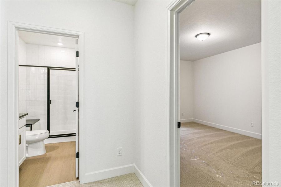 Spacious, unfurnished interior of a new home in Terrain Oak Valley, Castle Rock (Image 17).