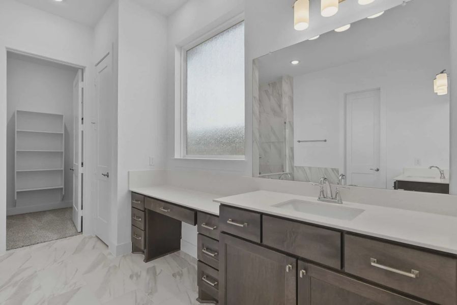 Representative furnished interior of a home built from the Nicklaus by Chesmar Homes in Riceland Alley Loads, Mont Belvieu (Image 44).