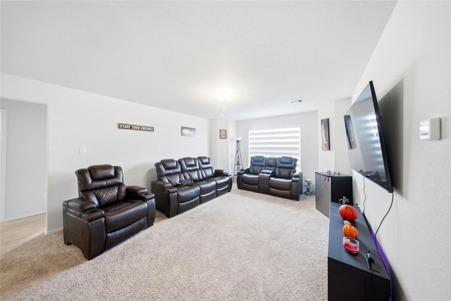 Furnished interior view inside a new home in Sierra Vista, Iowa Colony (Image 23).