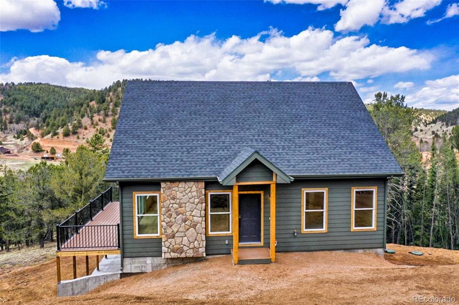 Front exterior of a new home in , Divide, CO, highlighting curb appeal (Image 1). Front exterior of a new home in , Divide, CO, highlighting curb appeal (Image 1).
