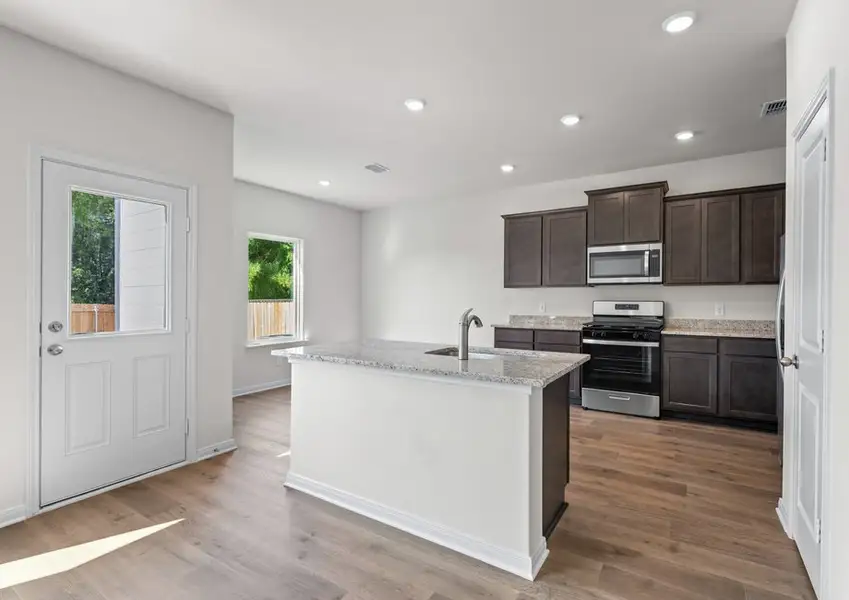 The kitchen has a convenient island.