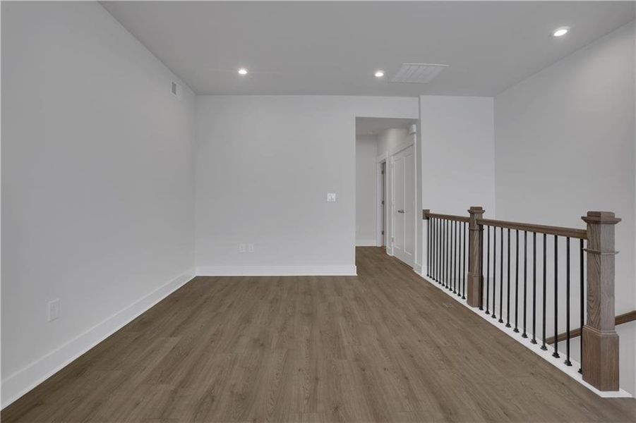 Spacious, unfurnished interior of a new home in The Paddocks at Doc Hughes, Buford (Image 34).