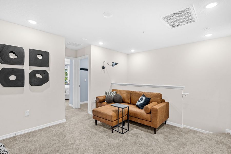 Representative furnished interior of a home built from the Malory by Hartizen Homes in Delaney Reserve, Deland (Image 61).