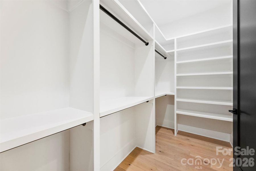 Primary Walk-in Closet Primary Walk-in Closet