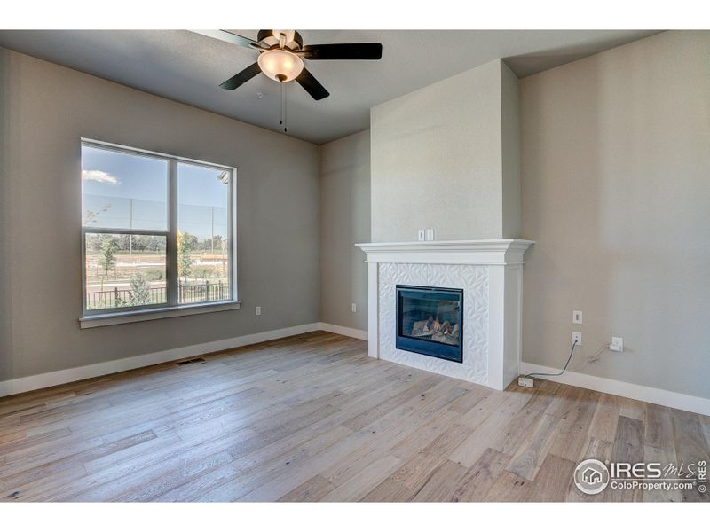 Living Room with Gas Fire place-  Photos not of the actual unit. Finishes vary.