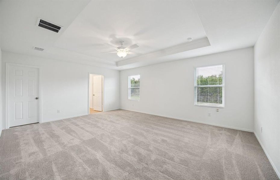 Spacious owner's suite with private bath