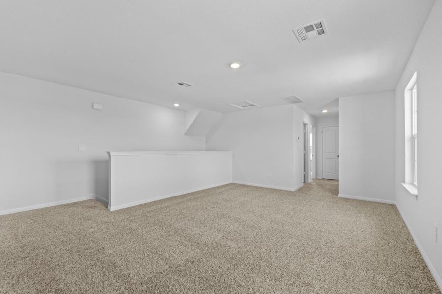 Spacious, unfurnished interior of a new home in Bar W Ranch, Leander (Image 25).